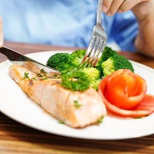 Be sure to eat a healthy diet to keep your body strong and your implants secure