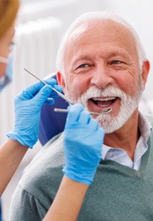 a patient receiving dental care from a dentist near Tyler